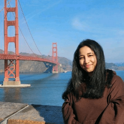 isha in front of the golden gate bridge